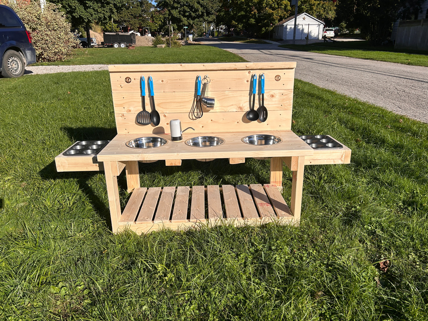 Large mud kitchen with tap and double muffin tins